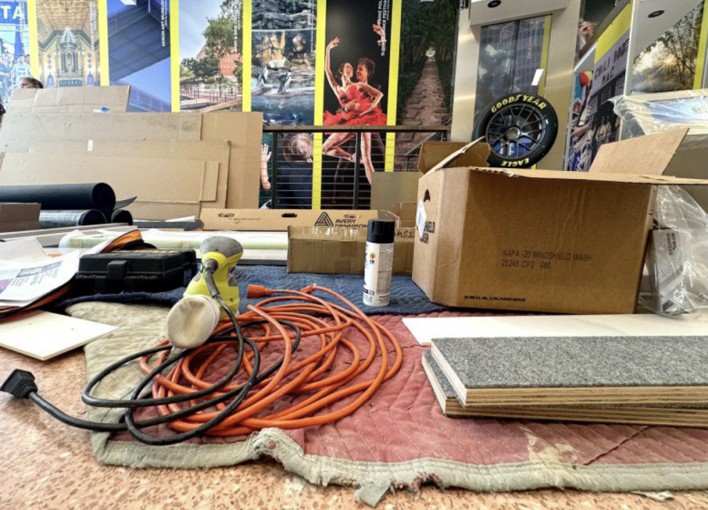 NASCAR tire sits among work tools, boxes and construction material on the first floor of the Akron History Center. The tire was donated by Goodyear, one of the center’s major donors. Exhibits are being installed in the building and an opening date is still to be determined. (Kevin Dilley / Signal
Akron)