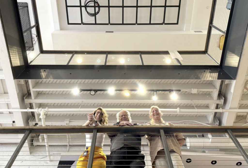 Caitlyn Conley (left), David Lieberth and Leianne Neff Heppner pose for a picture at the Akron History Center. Heppner is president and CEO of the Summit County Historical Society, and Lieberth is president of the Akron History Center, Inc. Conley is a local history and museum specialist at Akron-Summit County Public Library. (Kevin Dilley / Signal Akron)